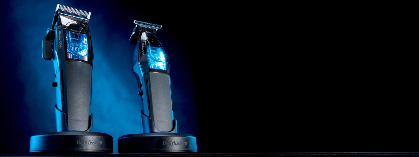 matte black barber clipper and trimmer with blue lighting in background