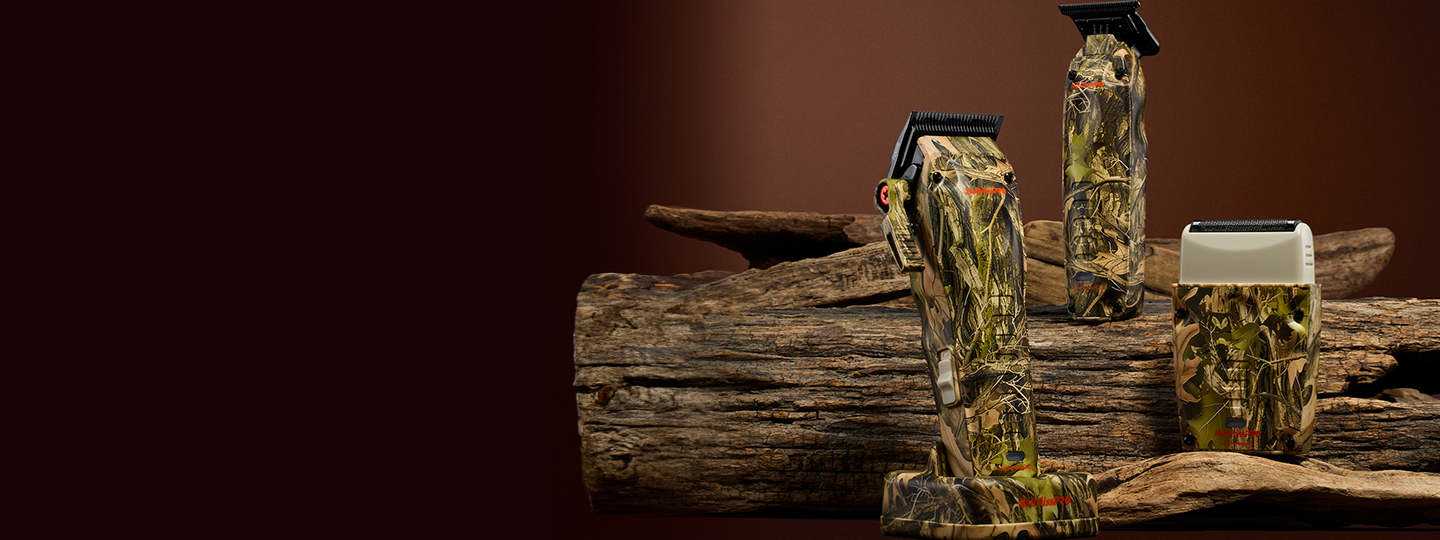 BaBylissPRO camouflage barber clippers and trimmers displayed on wood